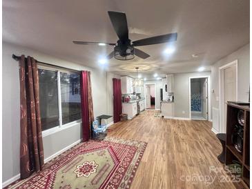 Bright living room with hardwood floors and access to kitchen at 1210 Butler St, Salisbury, NC 28144