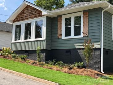 Charming craftsman style home with gray siding, wood accents, and landscaped yard at 535 Brooklyn Ave, Cramerton, NC 28032