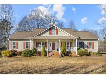 One-story house with front porch, landscaping, and a brick walkway at 1357 Meadowdale Rd, Rock Hill, SC 29732