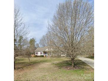 Ranch home with front yard and long driveway at 1357 Meadowdale Rd, Rock Hill, SC 29732