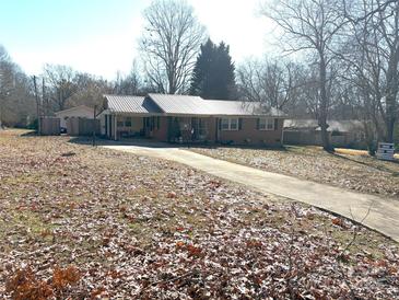 Brick ranch home with attached garage and long driveway at 1432 Poston Dr, Lincolnton, NC 28092