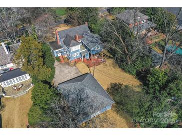Aerial view showing home, detached garage, and large backyard at 2300 Hopedale Ave, Charlotte, NC 28207