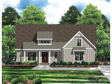 Craftsman style home with gray siding, brown roof, and landscaping at 1502 Baileys Run, Gastonia, NC 28056