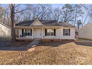 Adorable one-story house with front porch and small yard at 1013 Ashwood Pl, Salisbury, NC 28146