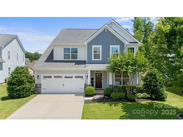 Two-story house with gray siding, white trim, and a two-car garage at 17527 Austins Creek Dr, Charlotte, NC 28278