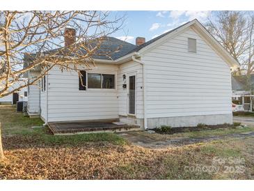 White house exterior with small front porch and landscaping at 207 Faulkner St, Clover, SC 29710