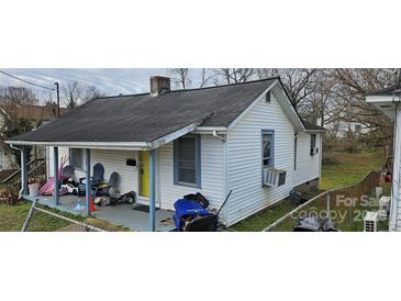 White sided house with porch and small yard at 308 S High St, Lincolnton, NC 28092