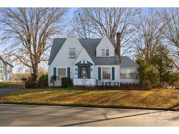 Charming two-story house with a gabled roof and landscaped lawn at 447 Nc 16 S Hwy, Taylorsville, NC 28681