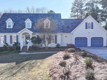 Beautiful two-story home with a two-car garage and well-maintained landscaping at 148 Tetbury Ne Ave, Concord, NC 28025