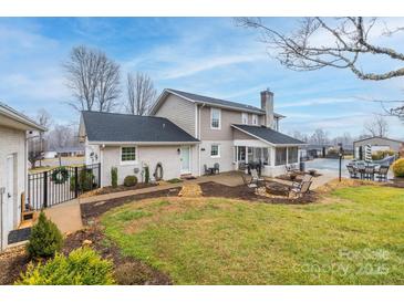 House with inground pool, patio, firepit, and detached garage at 4105 South Fork Ave, Hickory, NC 28602