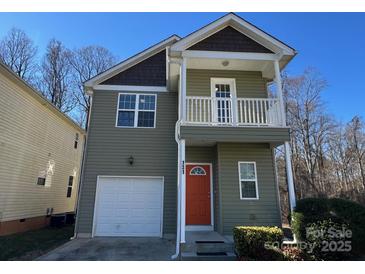 Two-story house with gray siding, orange door, and attached garage at 131 High Bluff Cir, Mooresville, NC 28115