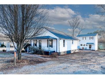 Charming white house with a front porch and large backyard at 320 Brown Rd, China Grove, NC 28023