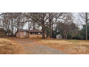 Ranch home with a covered porch and a spacious yard at 3169 Eden Terrace Ext, Rock Hill, SC 29730