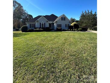 Ranch style home with spacious lawn and mature trees at 118 Sterling Dr, York, SC 29745