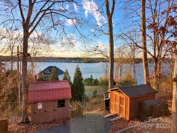 Scenic lakefront property with two storage sheds at 119 River Ridge Trl # E175/176, Mount Gilead, NC 27306