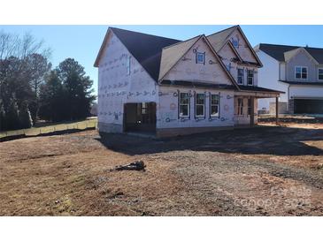 New two-story house under construction with a large front yard at 3215 Player Ct, Salisbury, NC 28144