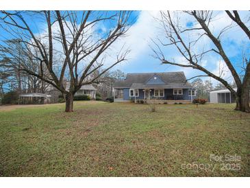 Ranch home with mature trees and a spacious yard at 2913 & 2901 Wesleyan Church Rd, Lincolnton, NC 28092