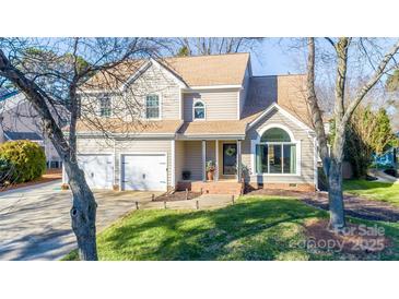 Two-story house with a neutral exterior, two car garage, and landscaping at 112 Northhampton Dr, Mooresville, NC 28117