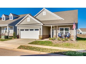 Attractive Craftsman style home with front porch and two-car garage at 40196 Crooked Stick Dr, Lancaster, SC 29720