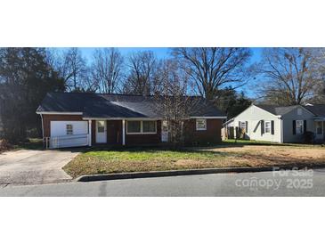 Brick ranch home with a ramp and carport at 835 Maple Ave, Salisbury, NC 28144