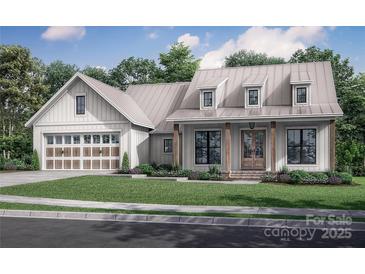 Craftsman style home with metal roof and attached two-car garage at 1012 Rosewood Dr # 14, China Grove, NC 28023