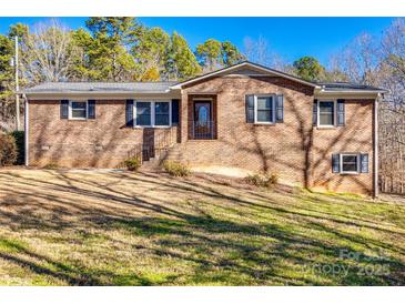 Brick ranch house with a large yard and mature trees at 4193 Walker Rd, Rock Hill, SC 29730