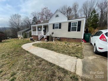 Charming single-Gathering home with a welcoming front porch and well-maintained lawn at 640 Mckee St, Albemarle, NC 28001
