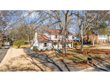 Charming two-story home with a well-maintained lawn at 7016 Foxworth Dr, Charlotte, NC 28226