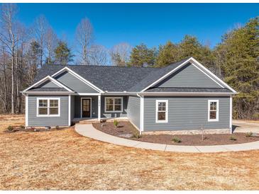 Gray exterior house with white trim, landscaping, and a curved walkway at 2572 Maiden-Salem Road Maiden Salem Rd # 4, Lincolnton, NC 28092