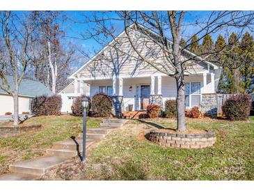 Craftsman style home with front porch and landscaped yard at 148 Tarrington Dr, Statesville, NC 28625