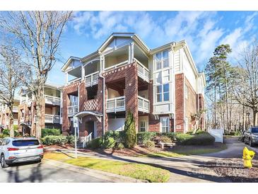 Brick condo building exterior with landscaping at 921 Northeast Dr, Davidson, NC 28036