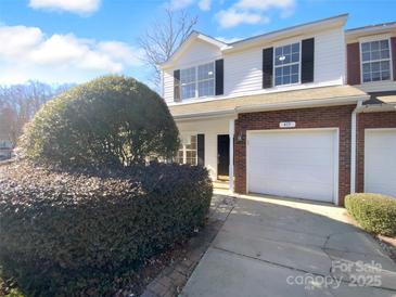 Inviting brick front exterior of two-story townhome at 415 Delta Dr, Fort Mill, SC 29715