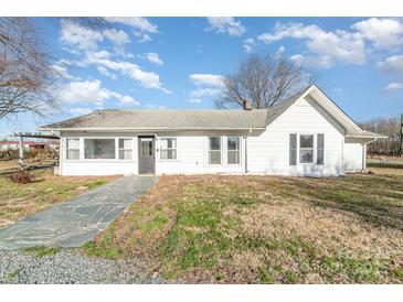 Exterior view of home with stone walkway at 1209 Austin Chaney Rd, Wingate, NC 28174