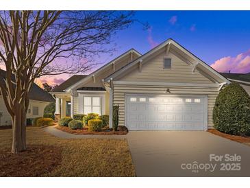 Attractive exterior of a one-story home with a two-car garage at 1024 Knob Creek Ln, Tega Cay, SC 29708