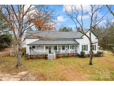 Charming farmhouse with wrap-around porch and large yard at 2633 Jb Denton Rd, Lancaster, SC 29720