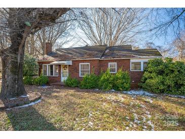 Brick house with mature landscaping and a spacious yard at 3513 Startown Rd, Newton, NC 28658