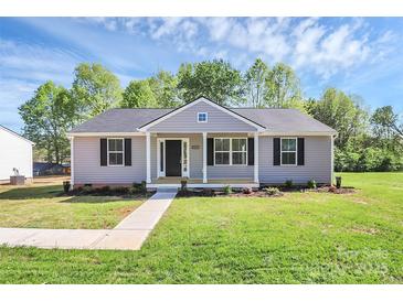 Charming single story home featuring gray siding, black shutters, and a well-manicured lawn at 3321 15Th Sw Ave, Hickory, NC 28602
