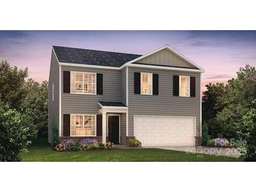 Two-story house with gray siding, a white garage door, and landscaping at 5067 Beargrass Dr, Dallas, NC 28034