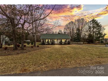 Charming house with well-manicured lawn and sunset view at 2590 Pierson St, Newton, NC 28658