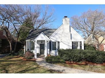 Charming white brick home with a welcoming front porch at 2912 Park Rd, Charlotte, NC 28209