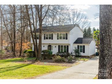 Two-story house with white siding, black shutters, and a landscaped yard at 3165 Wimbledon Ln, Rock Hill, SC 29732