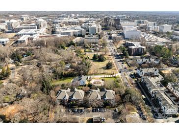 Spacious condo community with mature trees and beautiful surrounding cityscape views at 5617 Fairview Rd # 9, Charlotte, NC 28209