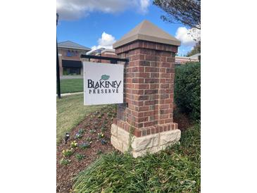 Blakeney Preserve community entrance sign with brick pillars and landscaping at 10244 Blakeney Preserve Dr, Charlotte, NC 28277