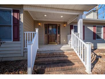 Brick steps leading to front door with side railings at 209 Meadowridge Dr, Maiden, NC 28650