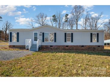 Well-maintained manufactured home on a landscaped lot at 820 Bethesda Rd, Statesville, NC 28677