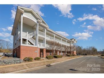 Brick multi-Gathering building with stairs and landscaping at 9261 Meadow Vista Rd, Charlotte, NC 28213