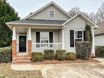 Charming craftsman style home with brick accents and a welcoming front porch at 173 Brookshire Dr, Fort Mill, SC 29715
