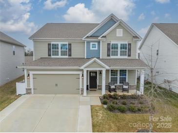 Two-story house with a neutral color palette and a two-car garage at 172 Longleaf Dr, Mooresville, NC 28117