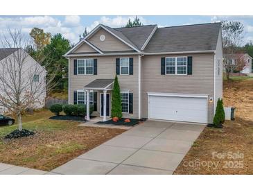 Two-story house with a neutral color scheme and a two-car garage at 2033 Roscommon Dr, Clover, SC 29710