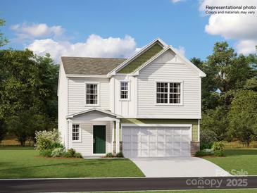 Two-story home with green accents and a two-car garage at 119 Mountain Bridge Way, Statesville, NC 28625